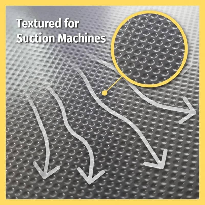 Textured vacuum sealer bag material with arrows pointing to the suction channels