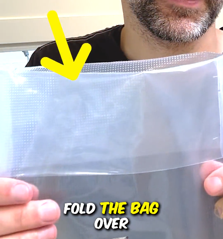Vacuum sealer bag with the top folded down before filling