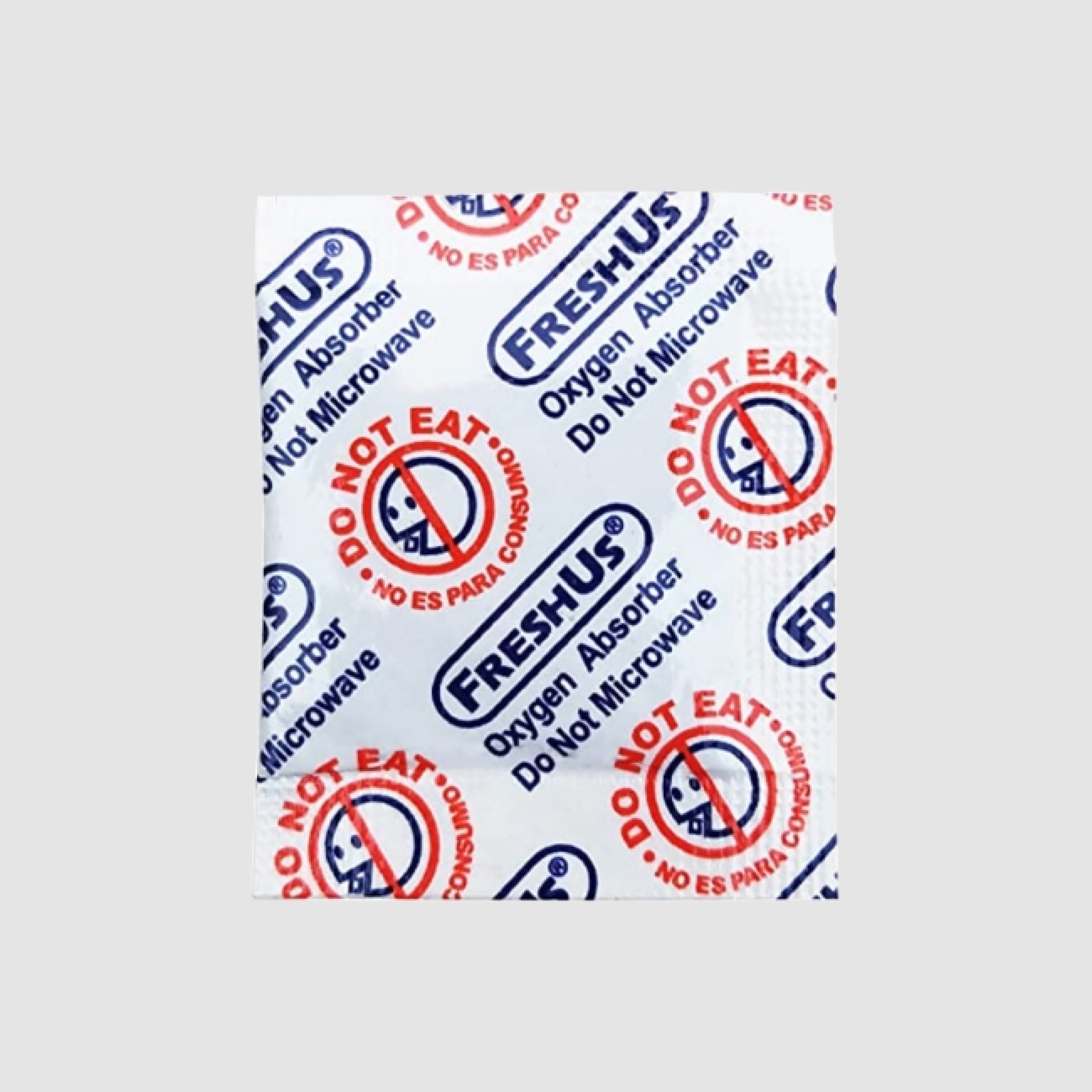 Oxygen absorber sachet next to dried food in a vacuum sealer bag